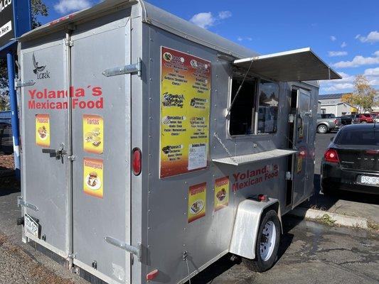 This taco truck blends in but don't pass it by! On west side of street.