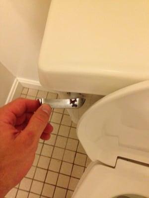 Broken toilet handle moving in