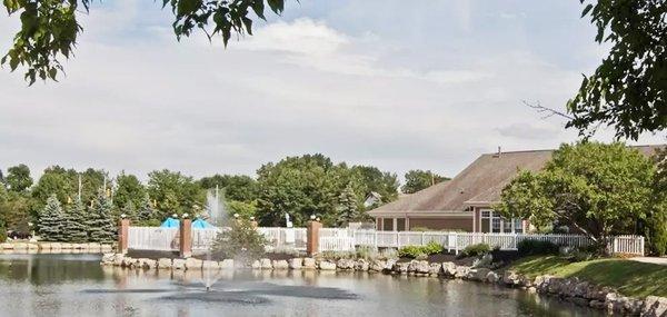 Clubhouse with Pond and Pool view