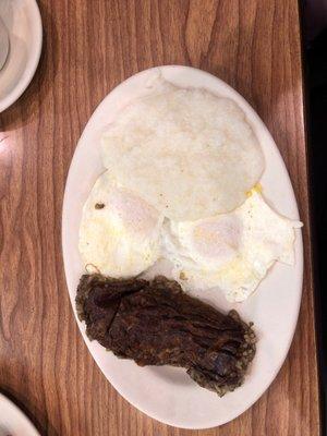 Liver pudding, grits and eggs.