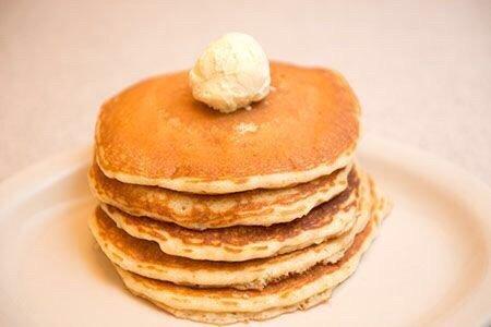 Full stack of our famous homemade pancakes made from scratch.