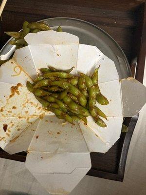 half eaten spicy edamame