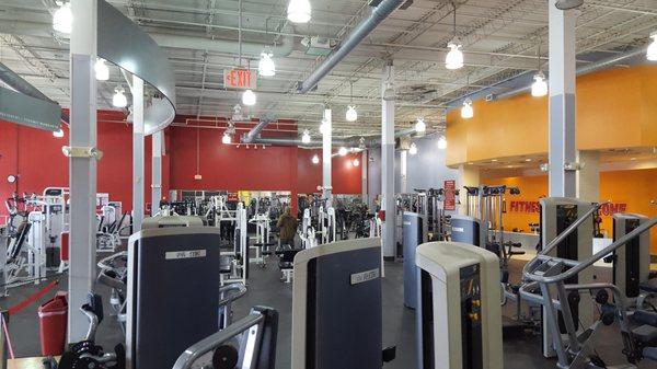 Large open workout area. High ceilings with newly painted walls.