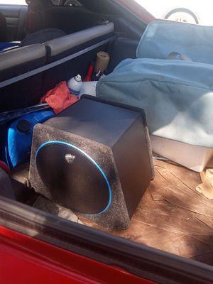 All in one subwoofer and amplifier in its own box held in place by brackets, so it won't move