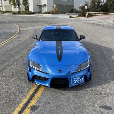 Custom Satin Black Vinyl Stripe and Graphics on this beautiful Toyota Supra!