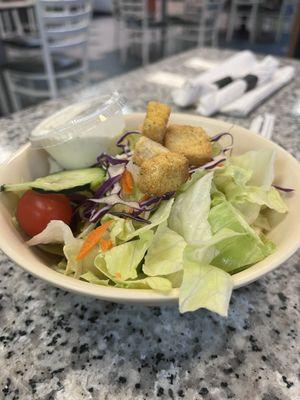 Old school salad with ranch dressing on the side.