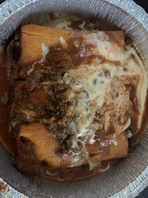 3 tamales with red & cheese sauce