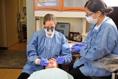 Dr. Kelly Paxton does a restorative procedure.