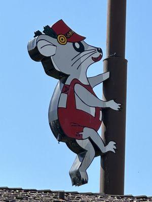 Advertising mouse on their sign pole