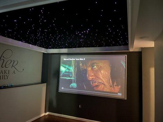 Movie playing, color starfield. Hidden speaker set up