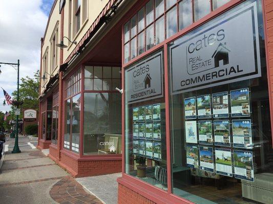 Stop by to visit our full display of properties showcased on the front windows