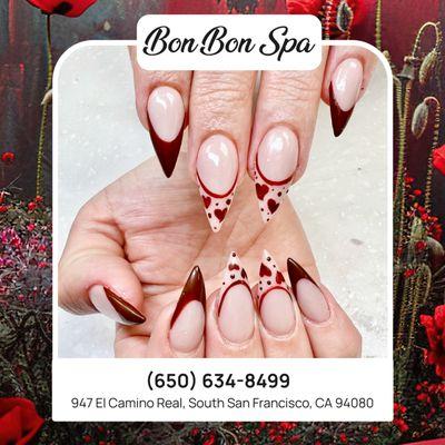 Show your love with every gesture! Our playful red heart nails are the perfect way to express your style and affection.