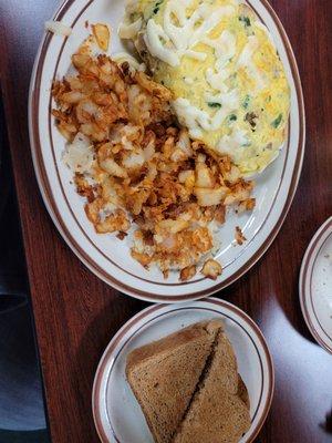 Anything omelet. It. Was. Huge. I chose broccoli, spinach, onion, sausage and Swiss. Extra crispy hashbrowns and toast.