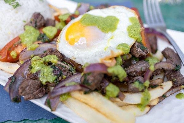 Lomo Saltado ($19 + $1.50/egg)