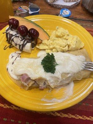 Best breakfast ever! This is a chicken cordon bleu crepe , there was also eggs fruit and fresh scones. 10/10 . Chef quality food