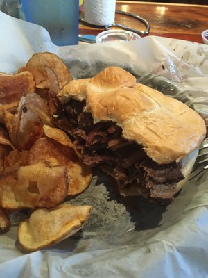 Prime rib sandwich with side of chips