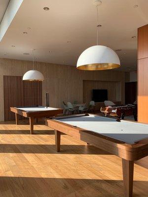 Custom twin walnut veneer pool tables