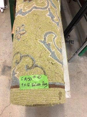 $120 for this nasty stained and worn out rug?  This is something you would find at the curb for free.