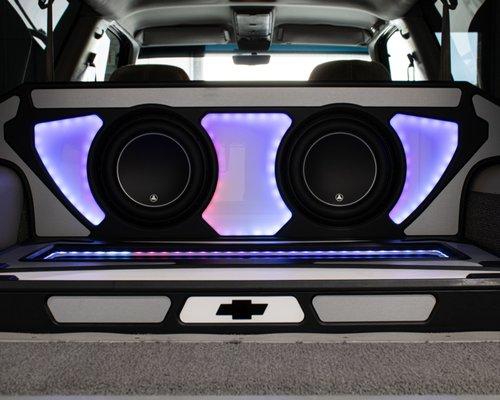 Custom designed & fabricated subwoofer enclosure and amp platform with LEDs.