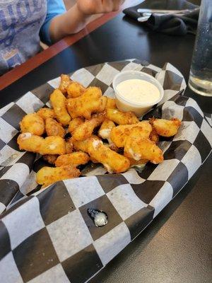 Cheese curds with a ranch based sauce. Very oily, breading fell apart, barely any cheese. Don't recommend