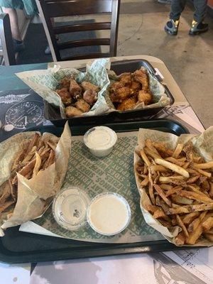 Mango habanero and lemon pepper   Lemon pepper fries and regular fries.  Hard workers here.  Very polite