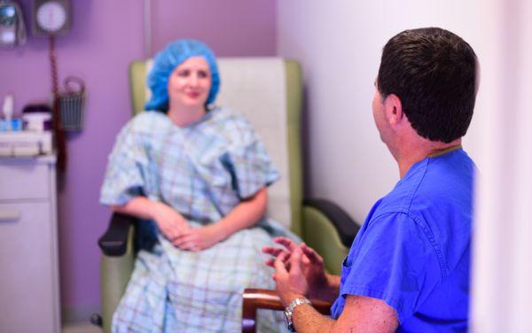 A patient meets with Dr. Copperman before her procedure