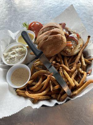 Cajun Love Burger plate with cool slaw and fries.