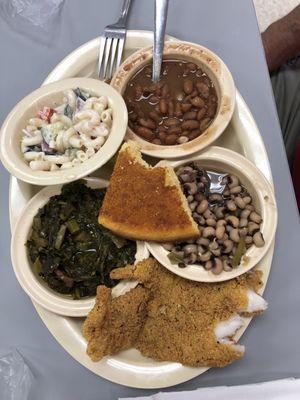 Fried catfish, outstanding collard greens, field peas and snaps, pinto beans, macaroni salad and cornbread.