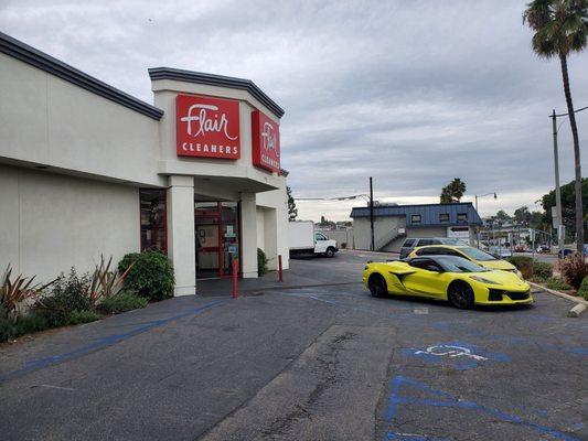 Yellow Corvette belongs to the contractor working on Flair building on the side.  Good money in contracting.