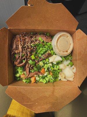 Wagyu rice bowl with garlic sesame soy sauce.