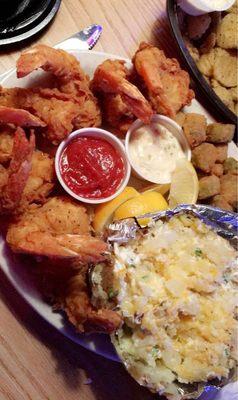 Fried shrimp, baked potato and okra