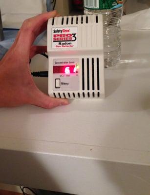 6.1 pCi/L radon in the living room, EPA limit is 4.0 pCi/L.  This is the second leading cause of lung cancer, only $1k to fix...