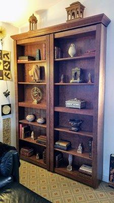 Bookcase closet door was not operating properly.  SF Handyman fixed it