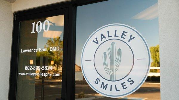 Valley Smiles front door and logo.