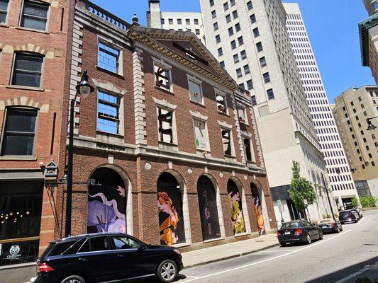 Adjacent to this cool historical facade. There is no building, just this wall!