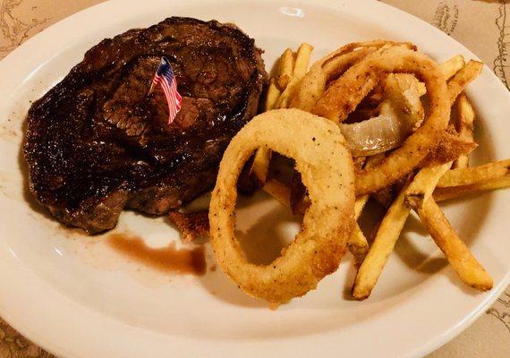 Bison steak with onion rings