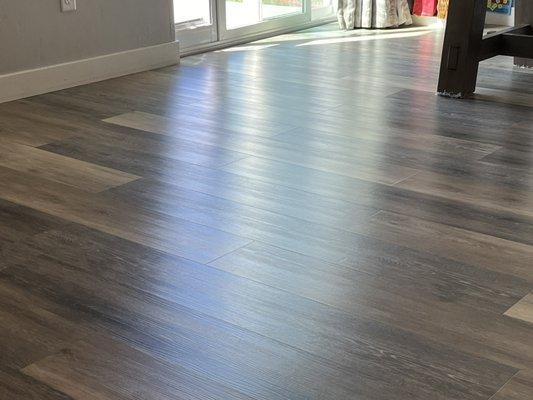 Spotless luxury vinyl planks! Call for a quote