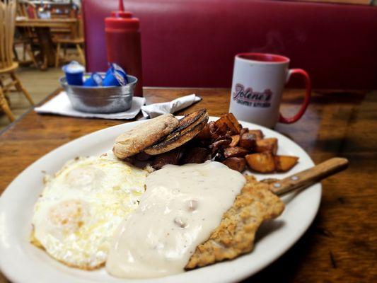 Chicken Fired steak, eggs medium, home fies, english muffin, and coffee.