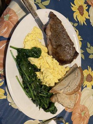 Amazing Healthy Stake Breakfast with seasoned stake and sautéed spinach.  This morning at the Roost I had the best breakfast!