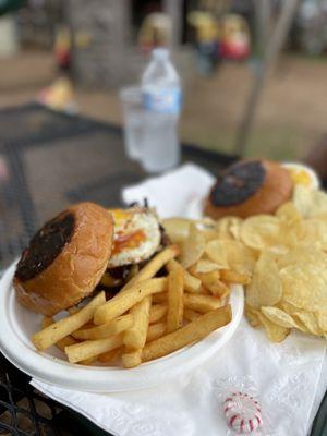 Two Farmhouse Burgers with fries and chips