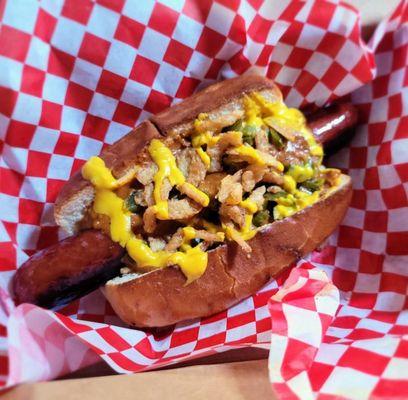 Texan dog - beef frank, chili, pickled jalapeno, crispy onion, mustard