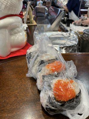 $5/each. Mentaiko and Ajitama (soy sauce egg). Made fresh and warm!