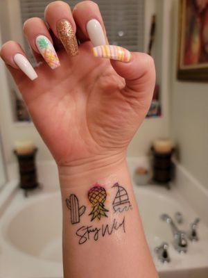 Got  a new tattoo & nails to match. She did a great job. I've received so many compliments. Thank you for bringing my vision to life!