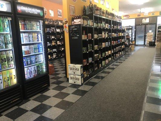 Looking down the American craft beer room from the back