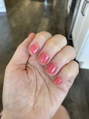 Pink sparkly short nails