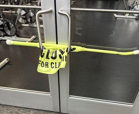 The floor is dry yet the female janitor had yet to remove the sign. She has been doing this for almost a month