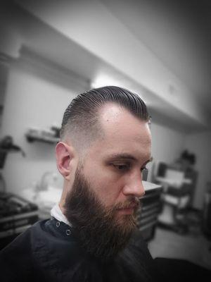 Skin fade slick back with med pomp