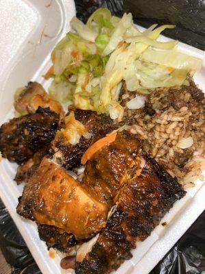 Large 7. Jerk Chicken side of rice and cabbage