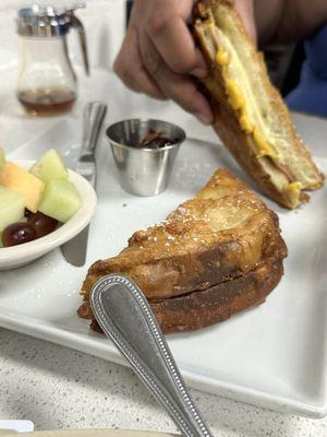 Amazing Monte Cristo, the fry batter is like funnel cake married a waffle. Get it!