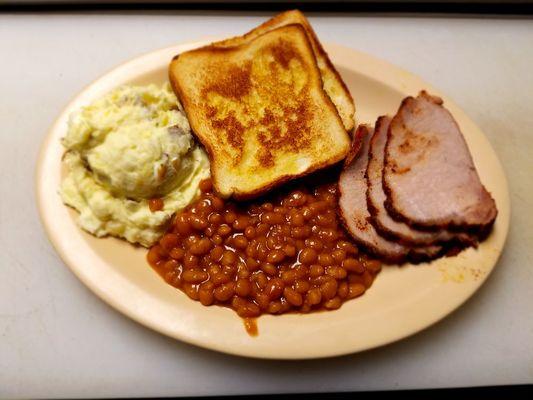 Smoked pork loin. Potato salad, Baked beans and toast